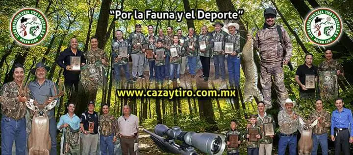 Socios del club con sus trofeos bajo el lema “Por la fauna y el deporte”
